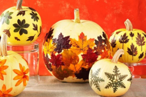 Pumpkin decorated with fall leaves